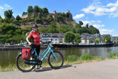 Guest posing at the river saar in saarburg