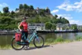 Guest posing at the river saar in saarburg