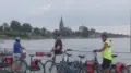 Cyclists taking the ferry to kessel